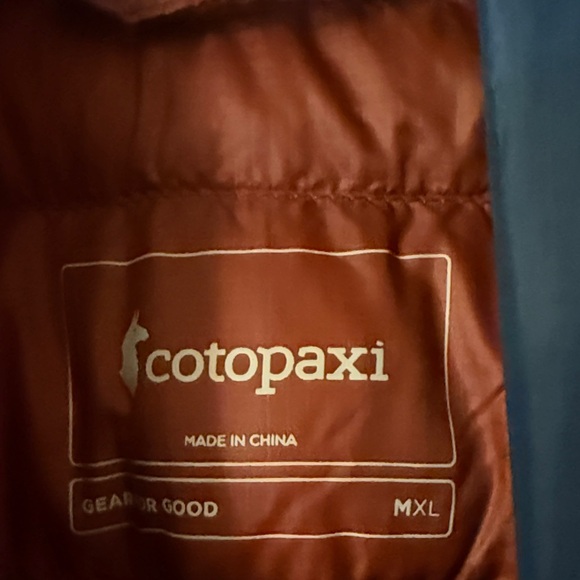 Cotopaxi Blue Jacket with Orange and Yellow Accents - Picture 2 of 2